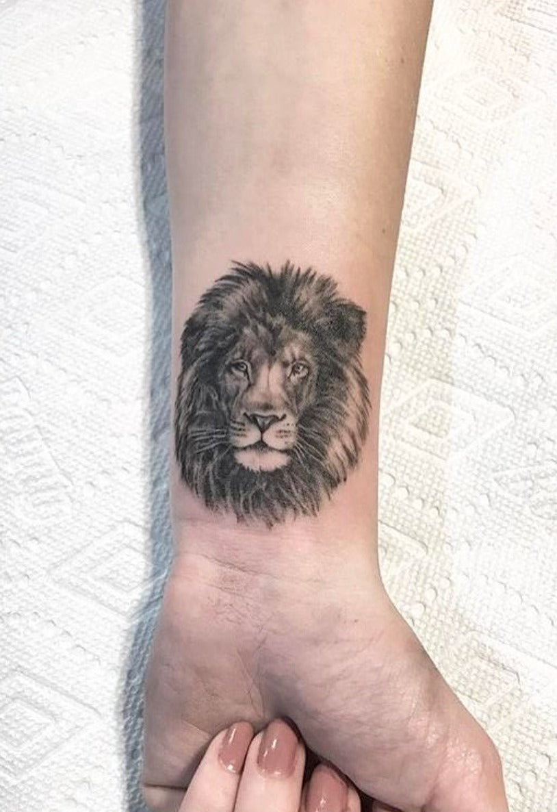 Legion Avegno Miniature Lion Wrist tattoo