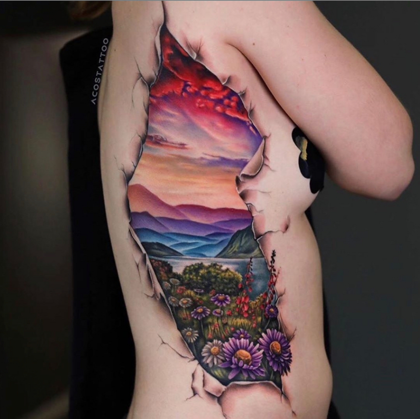 Side rib landscape tattoo